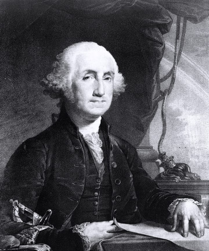 George Washington at his desk.